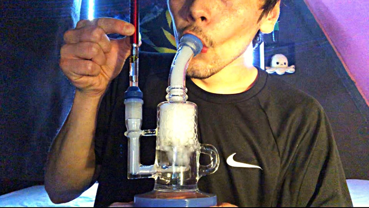 Smoking a dab pen out of a bong pt:2