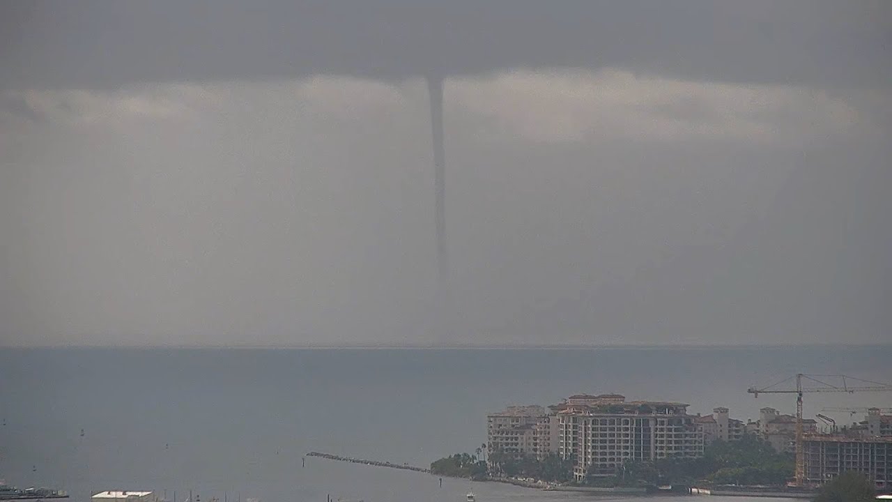 Waterspout touches down off the Port in Miami, Florida