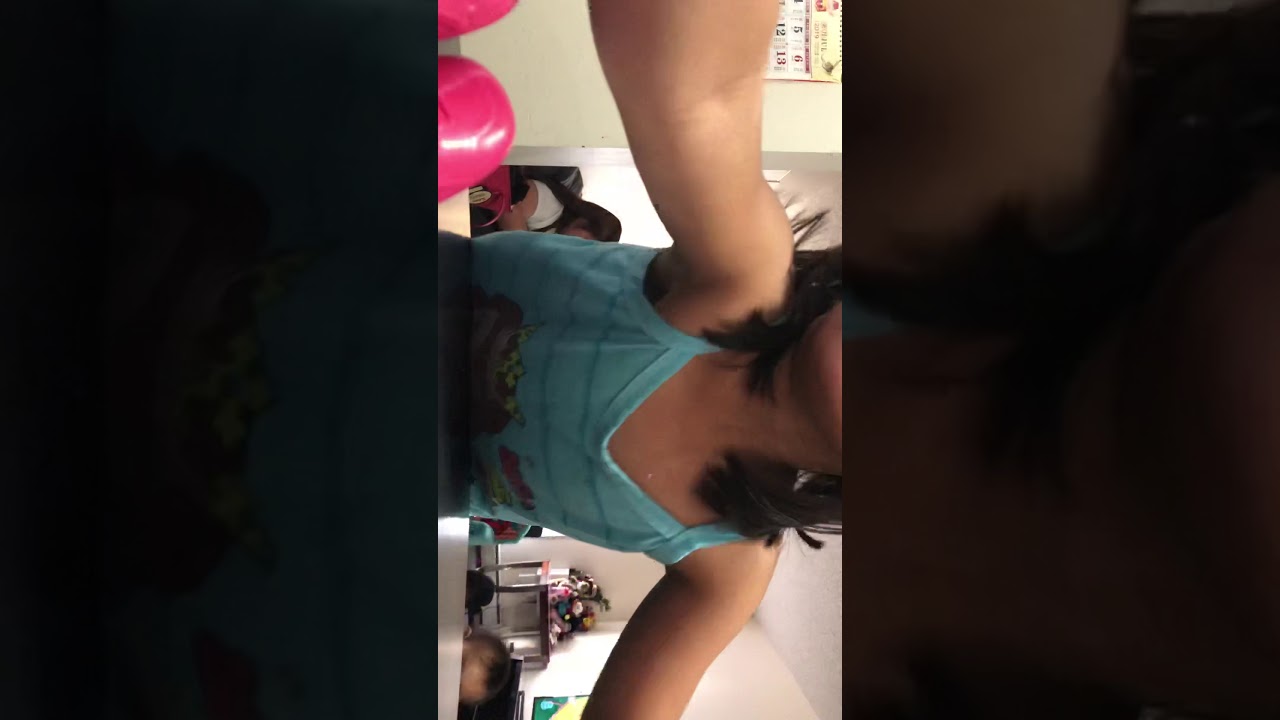 Audrey playing with her slime and her doll