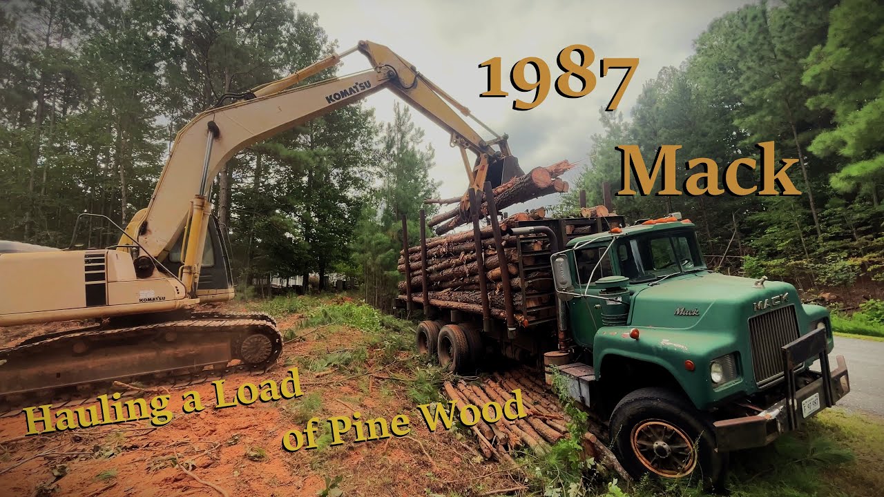 1987 Mack Log Truck Loading and Hauling Pine Wood