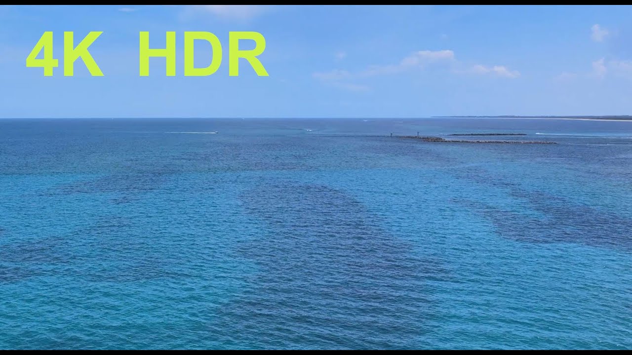 Flying the St. Lucie Inlet in Florida, including 10+ sharks.  4K HDR