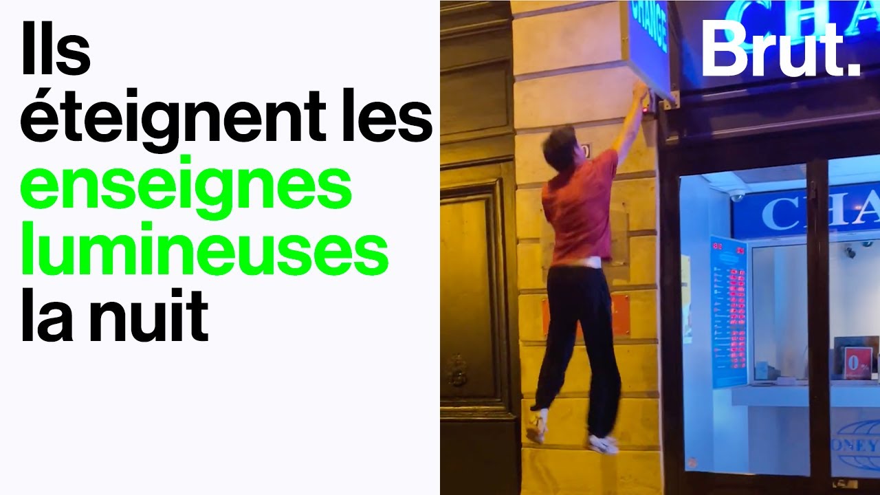 Des spécialistes du parkour éteignent les enseignes lumineuses la nuit
