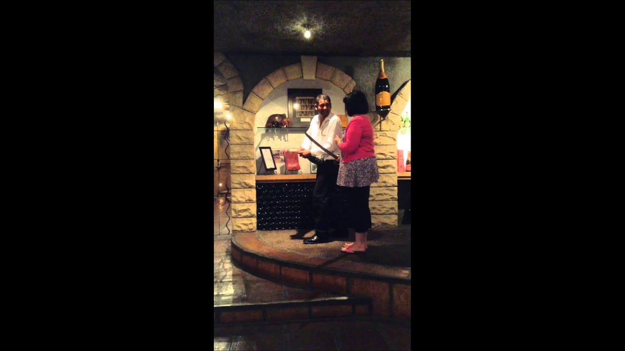 Sabrage demonstration at Haute Cabriere Tasting Room
