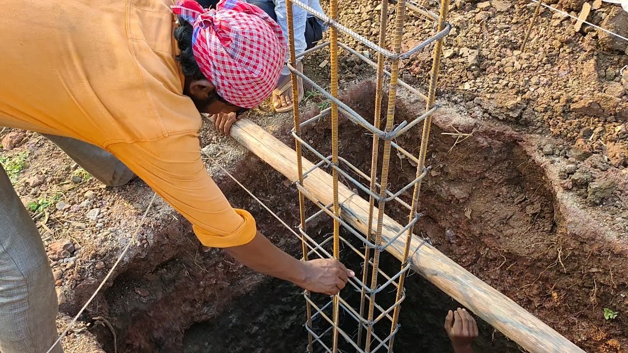 Placing of column rods on pcc and checking with gundu