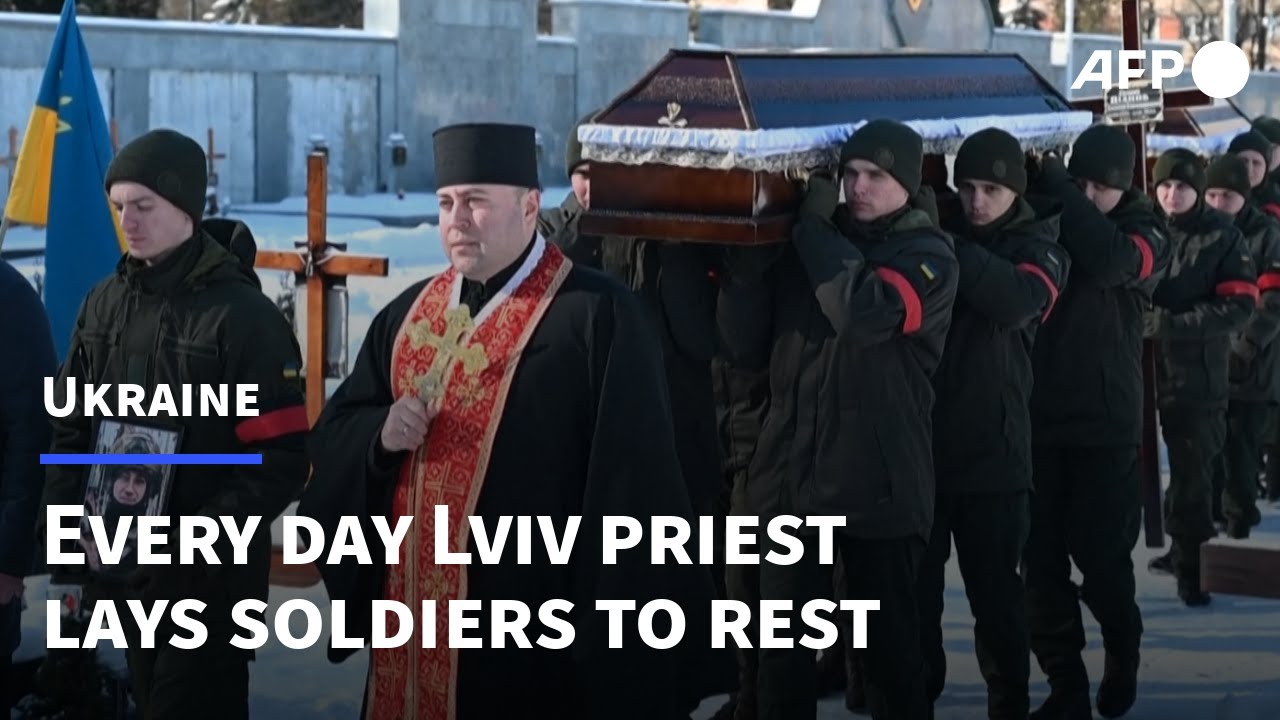 The Lviv Priest laying Ukrainian soldiers to rest every day | AFP