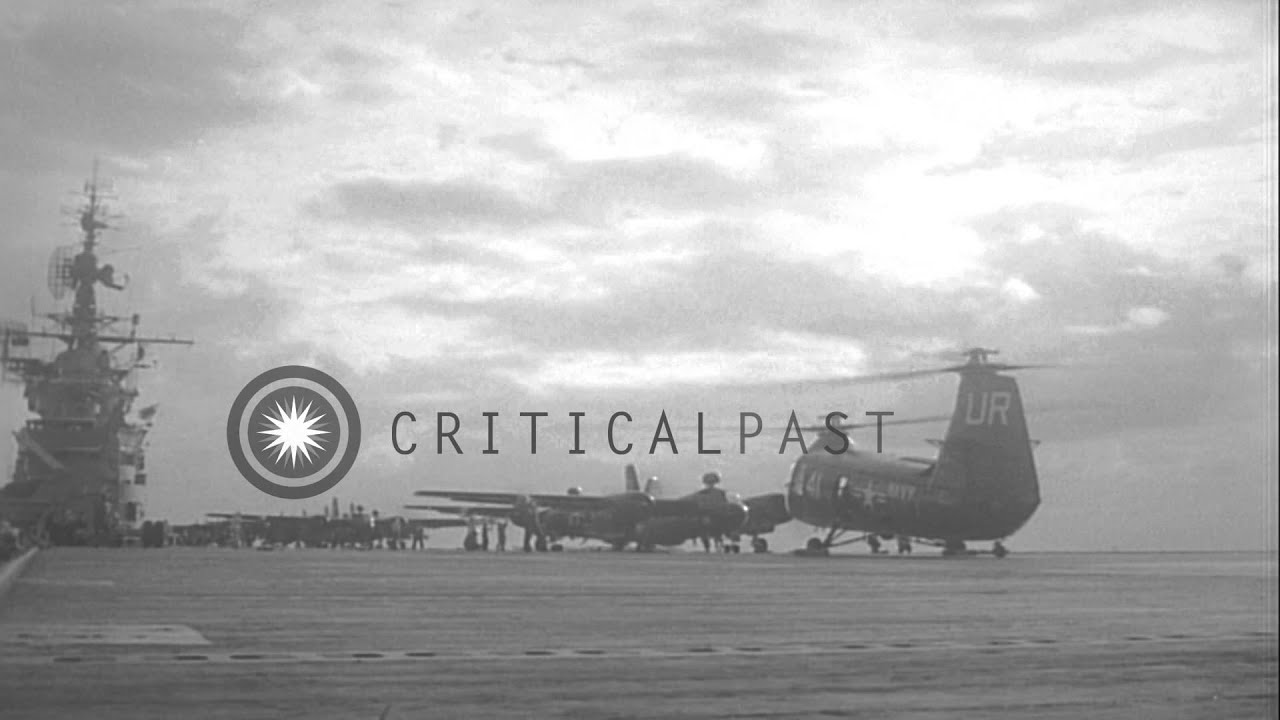 A US Grumman S2F tracker aircraft and a Piasecki HUP-2 helicopters take off from ...HD Stock Footage