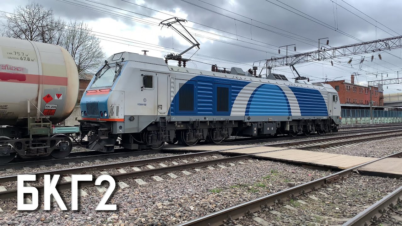 БКГ2-016, китайский электровоз Беларускай чыгункі неспешно ведёт товарняк, Смоленск. 2160p60