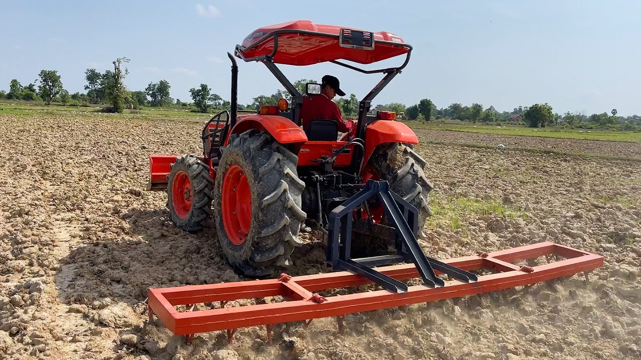 Tractor Kubota M6040 SU Plow Field Sand,Tractor Khmer Farmer