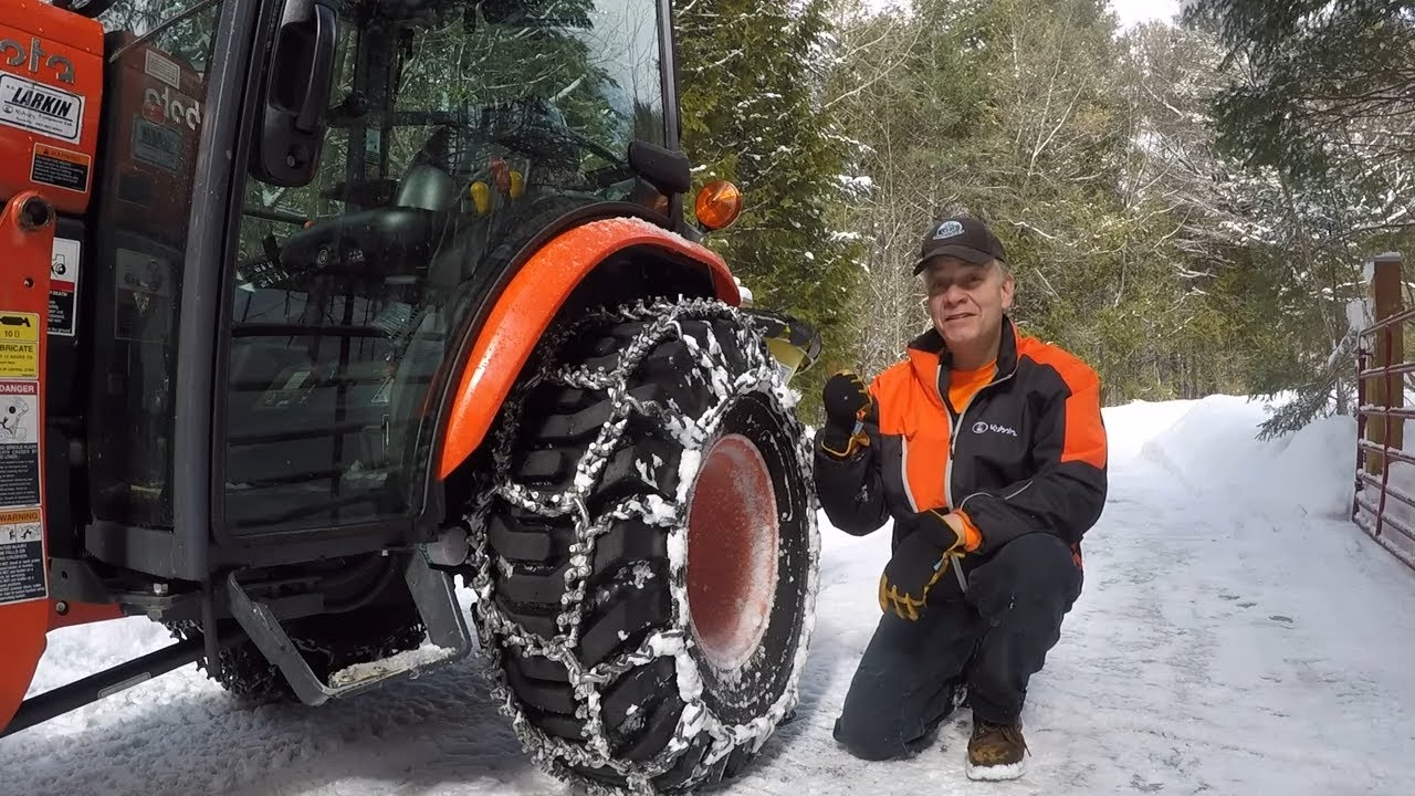 538 Skid Shoes and Studded Chains. Kubota LX2610 Cab Tractor. LX2980 Snow Blower.