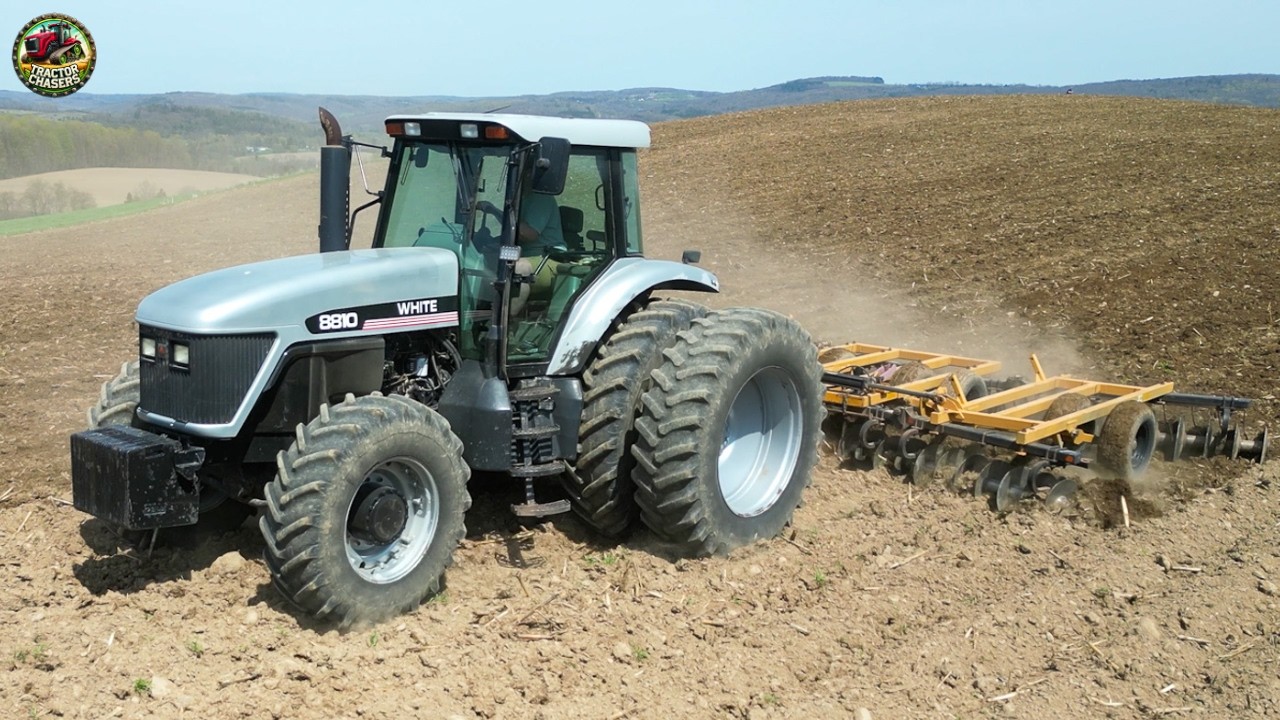 White 8810 Tractor Working with AMCO disk