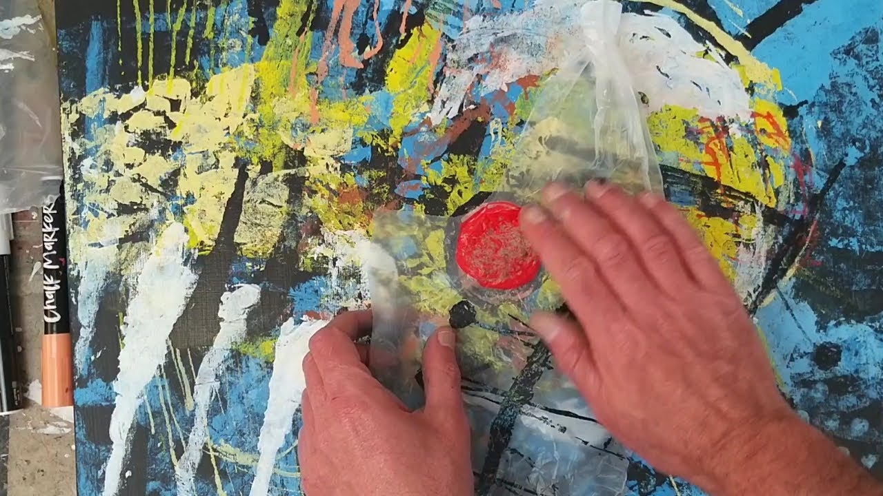 Monoprinting  chalk markers on stretched canvas using black gesso