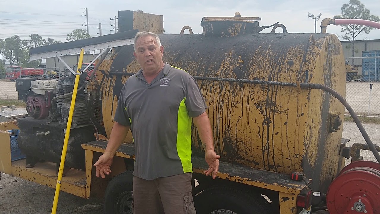 Sealcoat squeegee versus spray