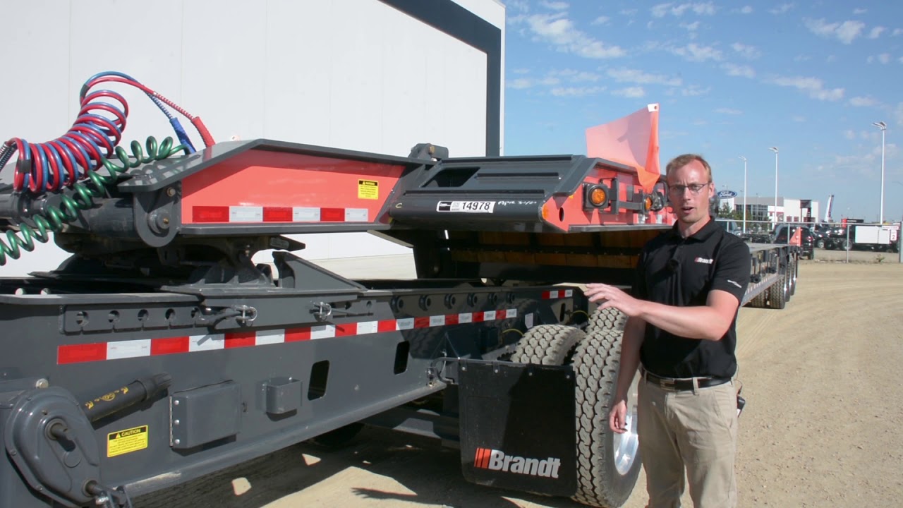 Brandt Equipment Solutions Ltd. | S500 Scissorneck Fixed Roll Oilfield Lowboy + L40 Live Roll Jeep
