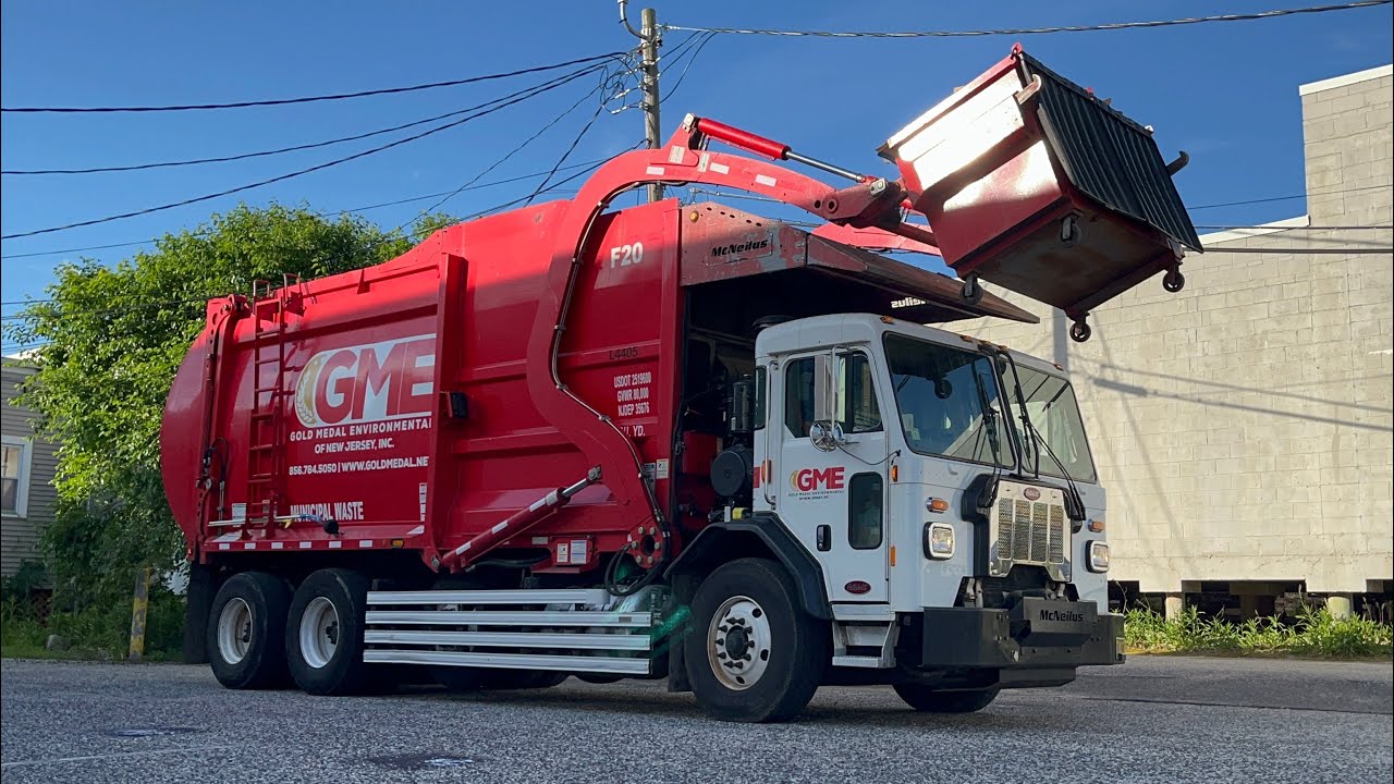 Gold Medal Environmental Pete 520 McNeilus Atlantic Series front loader garbage truck