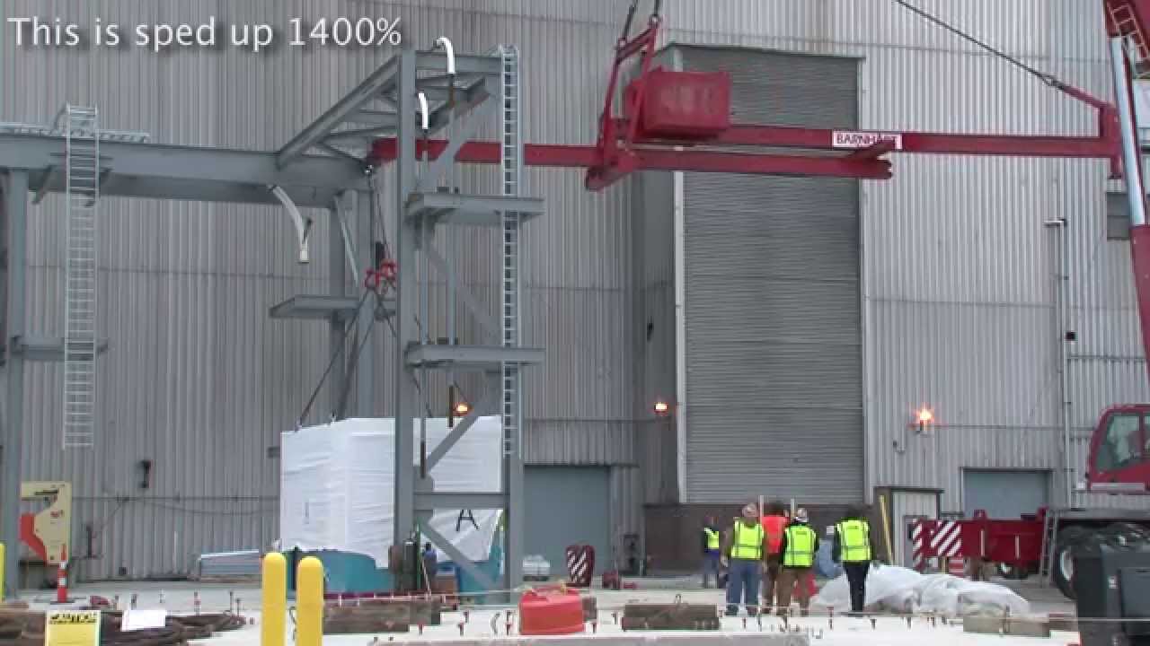 Barnhart and Barton Malow install a building with a cool cantilever crane