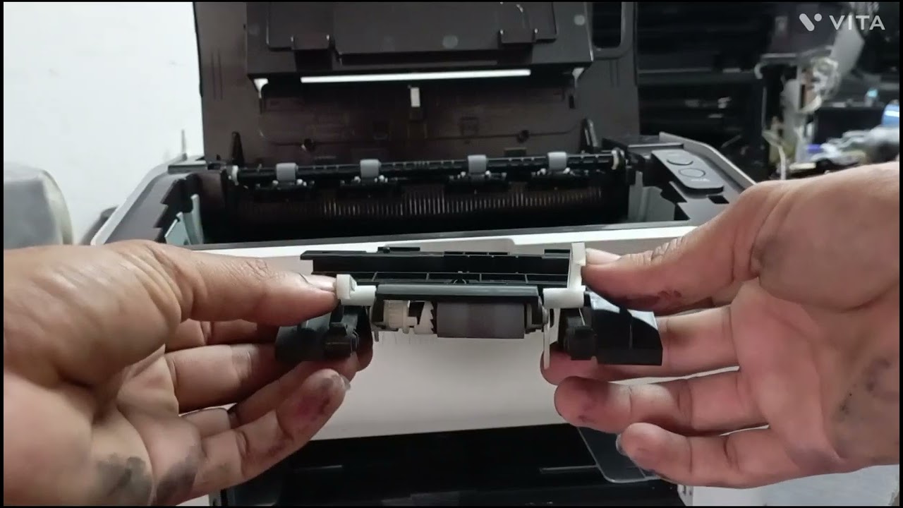 como cambiar sistema de cauchos de Samsung Xpress m2020w