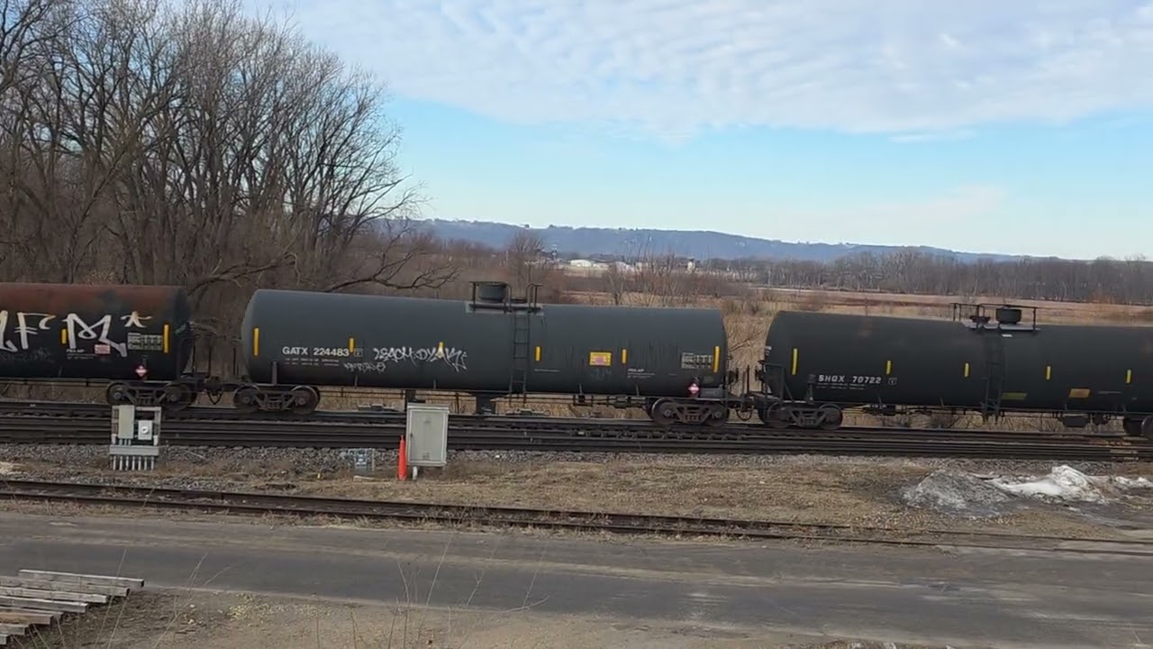 BNSF 4384 with 2 engines on the end! 5907 & 4030. Onalaska, Wi 2/16/26