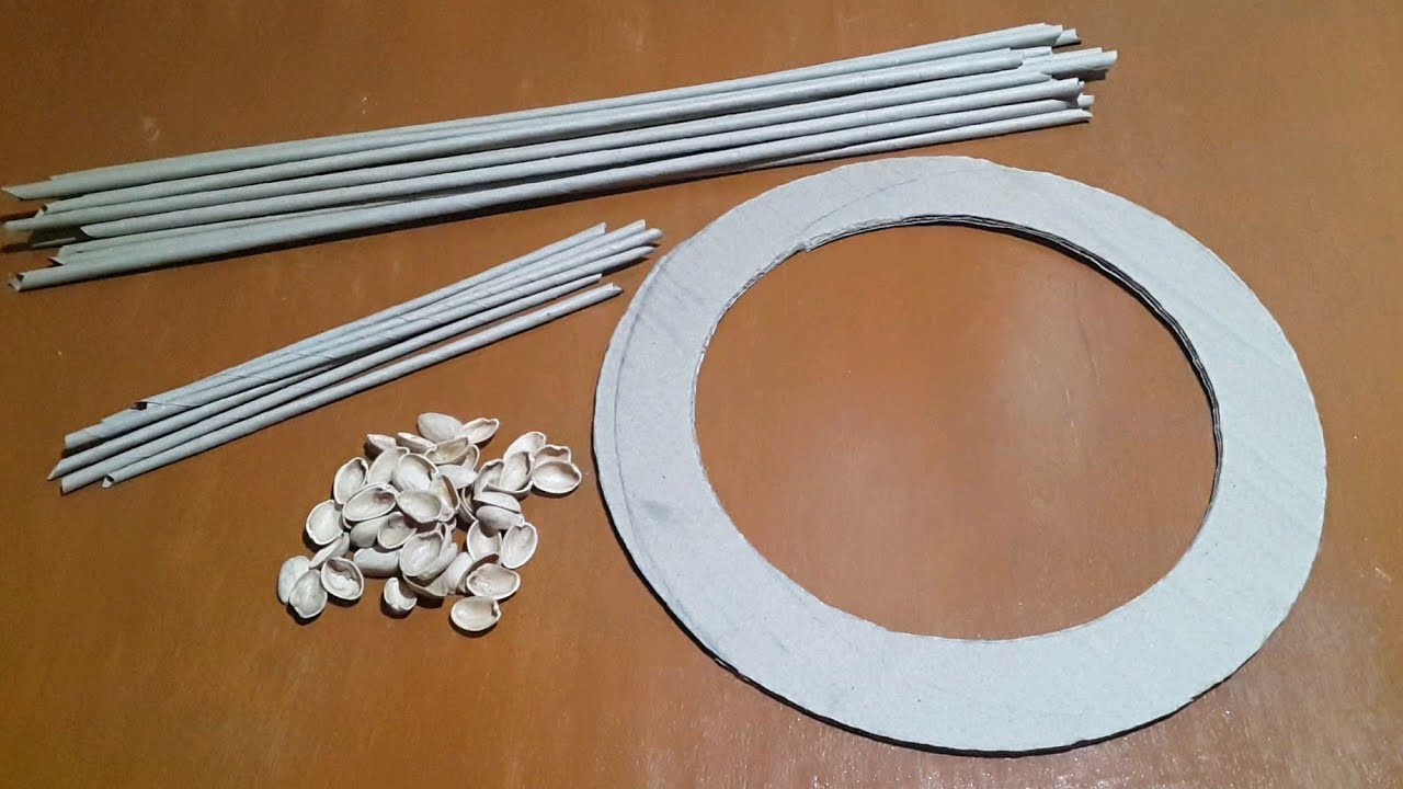Home decor idea. Diy Wall and door decoration ideas out of Waste Papers/Newspapers and Pista Shells.