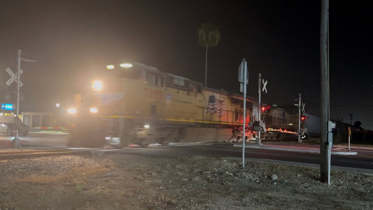 UP 7355 leading northbound manifest in Los Fresnos, TX | W ocean Blvd | Night |