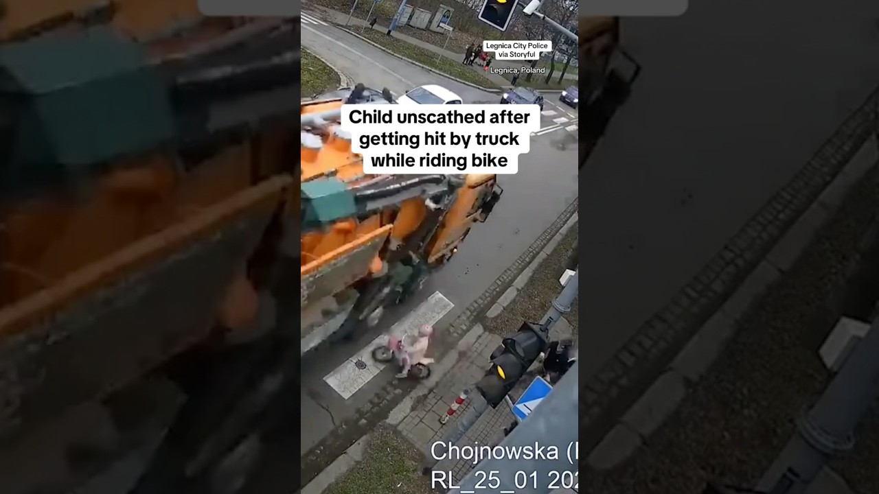 Child unscathed after getting hit by truck while riding bike #shorts