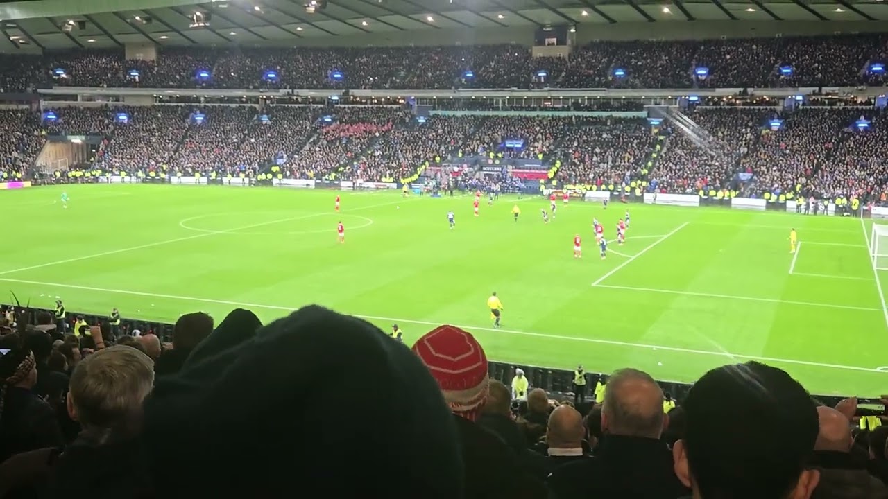 Unbelievable Kenny McLean chips Kasper Schmeichel from Scotland's own half to secure World Cup place