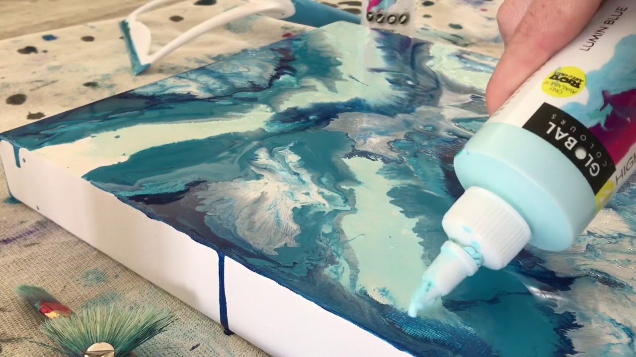 High flow fluid art with a squeegee  and catalyst wedges/blades