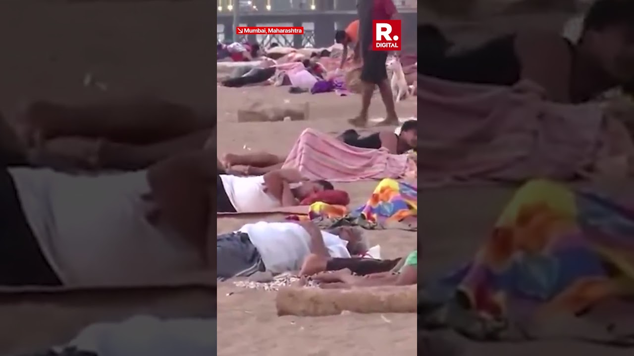 WATCH: Intense Heatwave & Power Cuts Force Mumbai Slum Residents to Sleep on Versova Beach