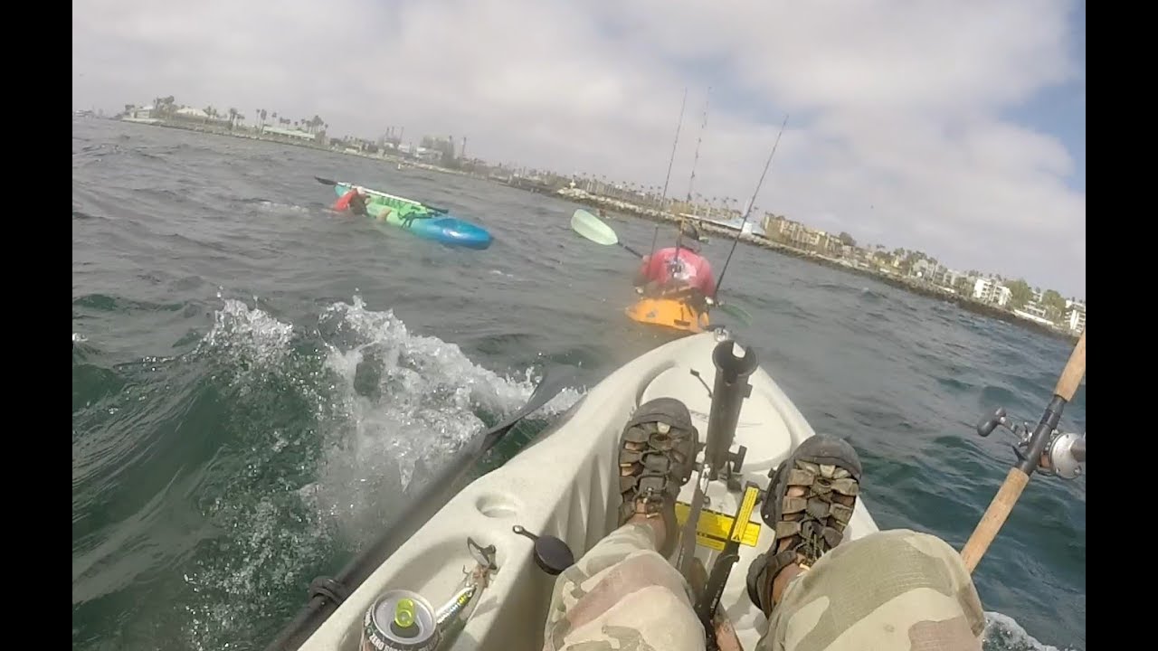 Kayaker capsizes - kayak fishing safety at Redondo Beach (Southern California).
