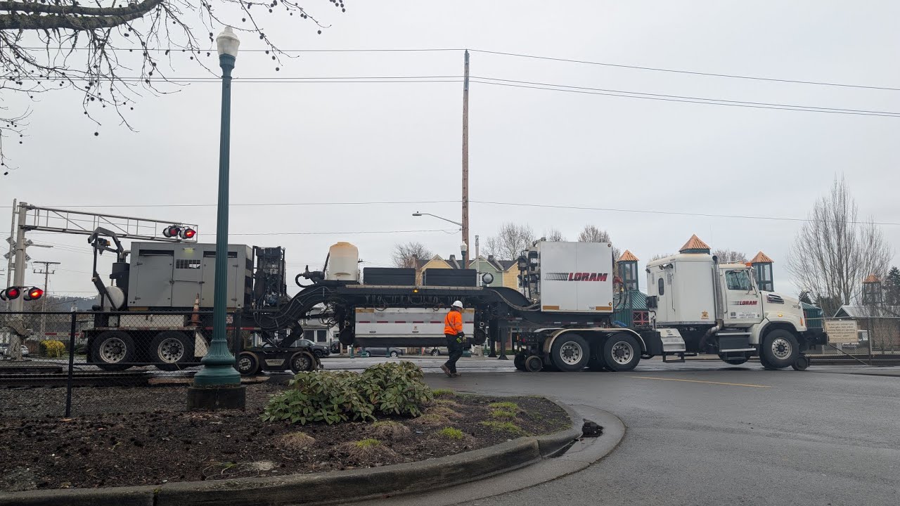 LORAM Rail Grinder Hi-Rail Semi grinds the Maple Street crossing in Sumner, Washington (3/6/26)