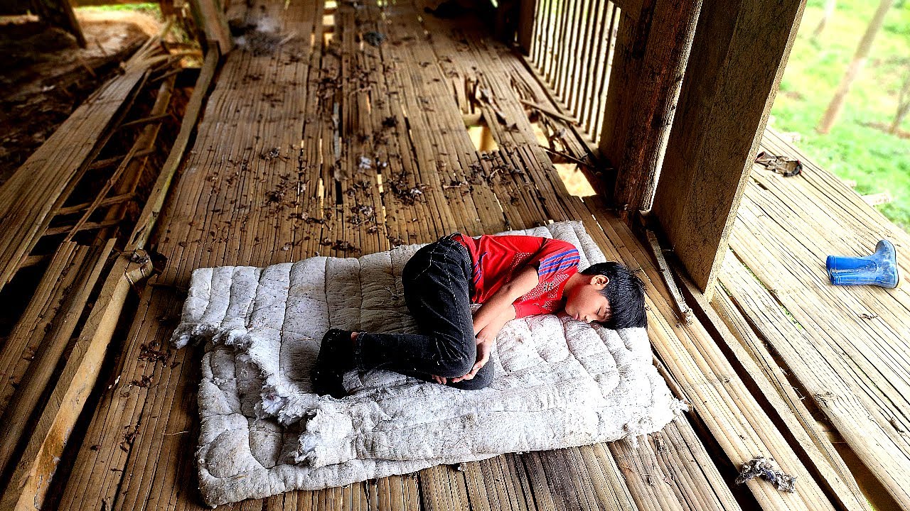 orphan boy sleeping in abandoned house