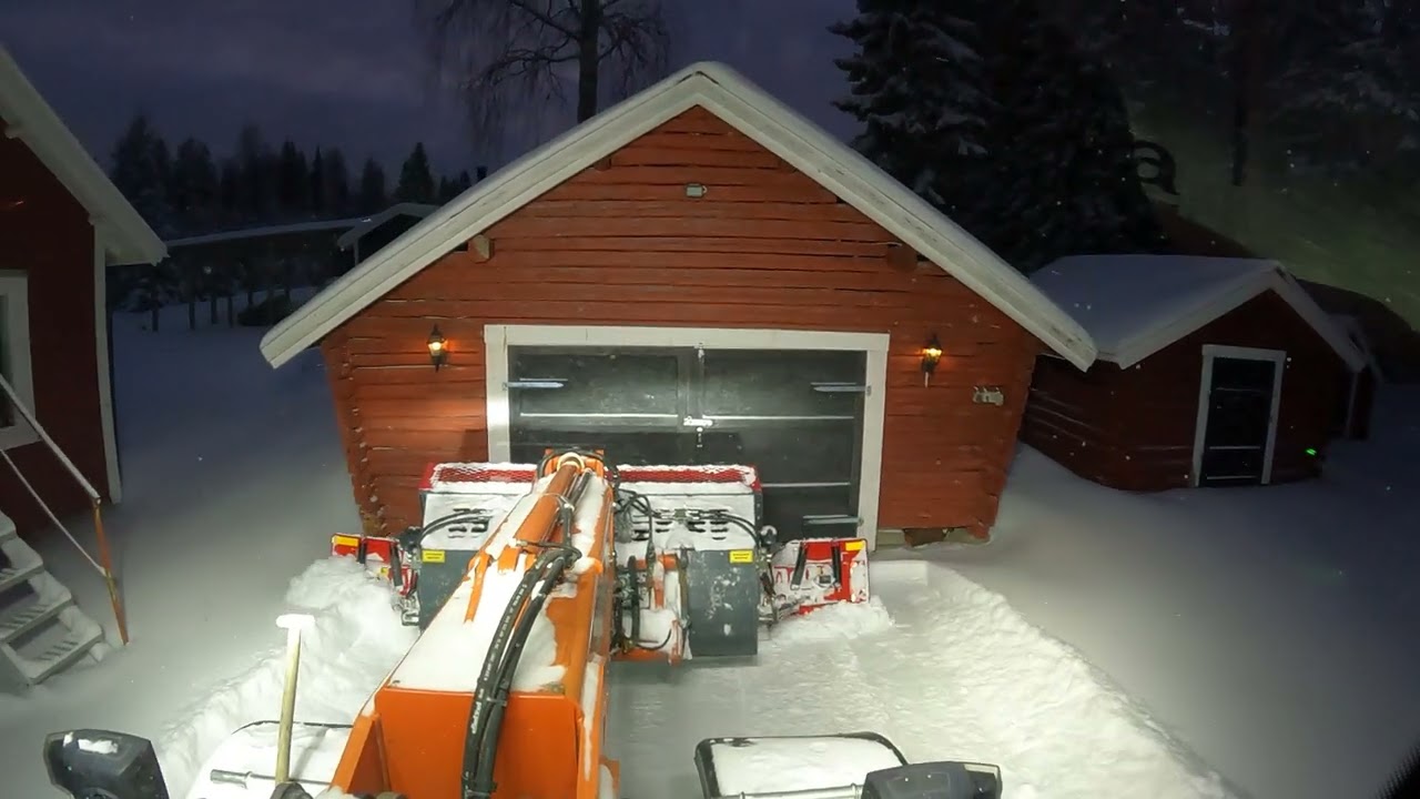 Plogar i djupsnön.