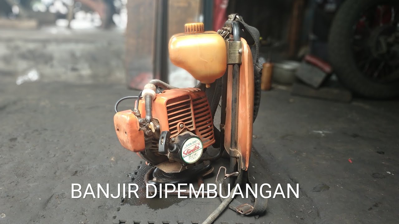 Service mesin rumput,, mengakali baud pembuangan yang netes terus.