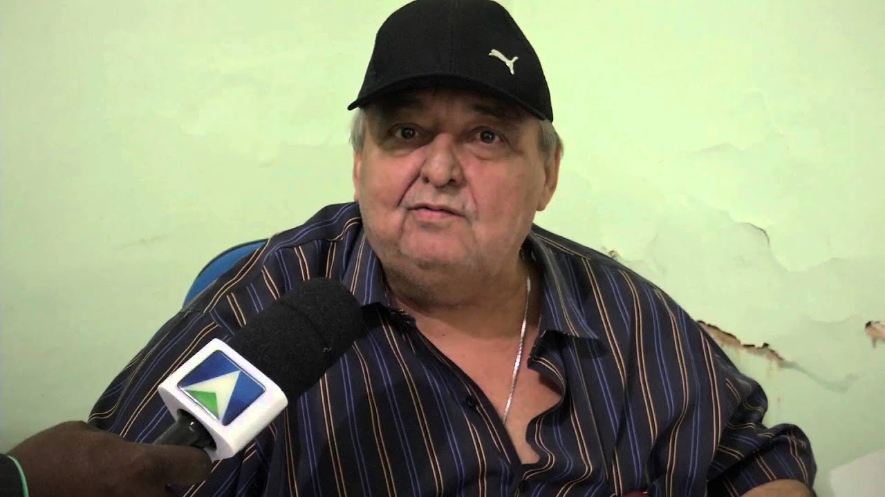 Homem preso acusado de homicídio e porte ilegal de arma