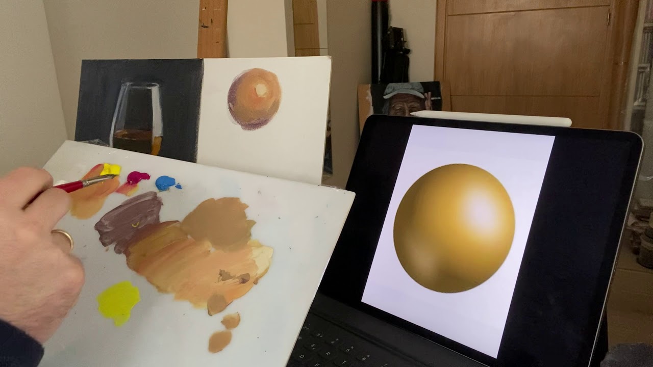 Volúmen de esfera dorada en acrílico