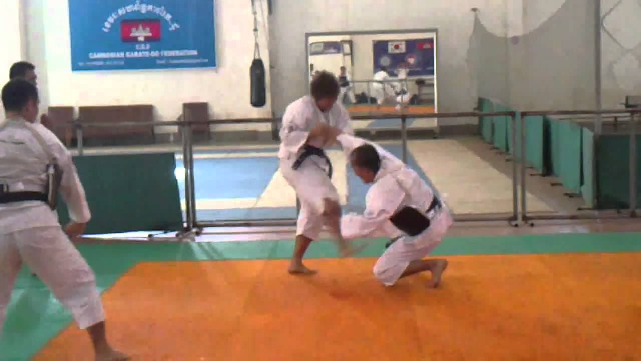 Woman fight with  three men in Kempo Karate Techniques