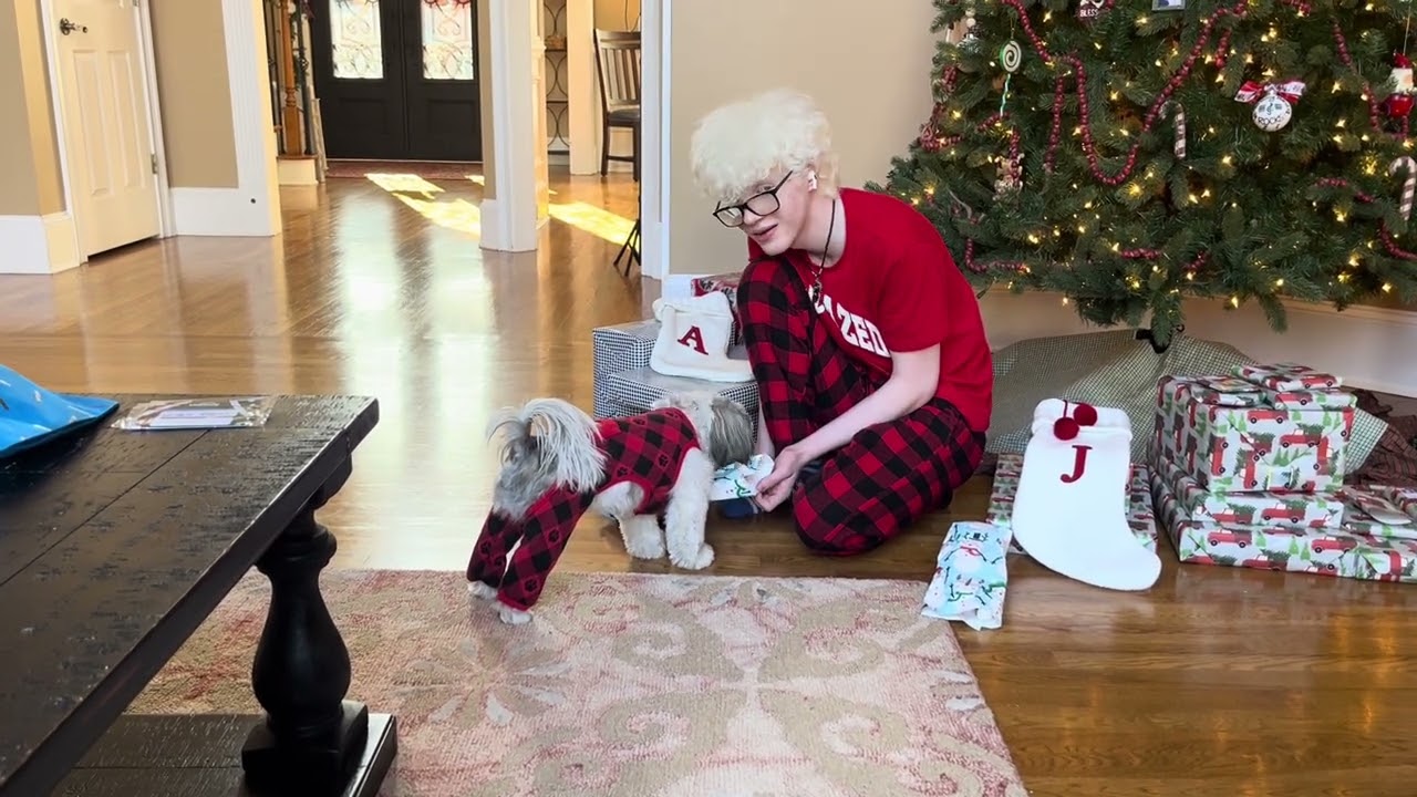Millie opening a present 12/25/24