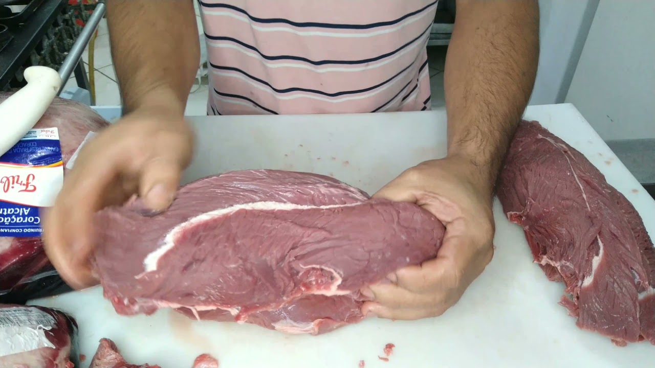 Ensinando limpar e corta coração da alcatra para espetinho.