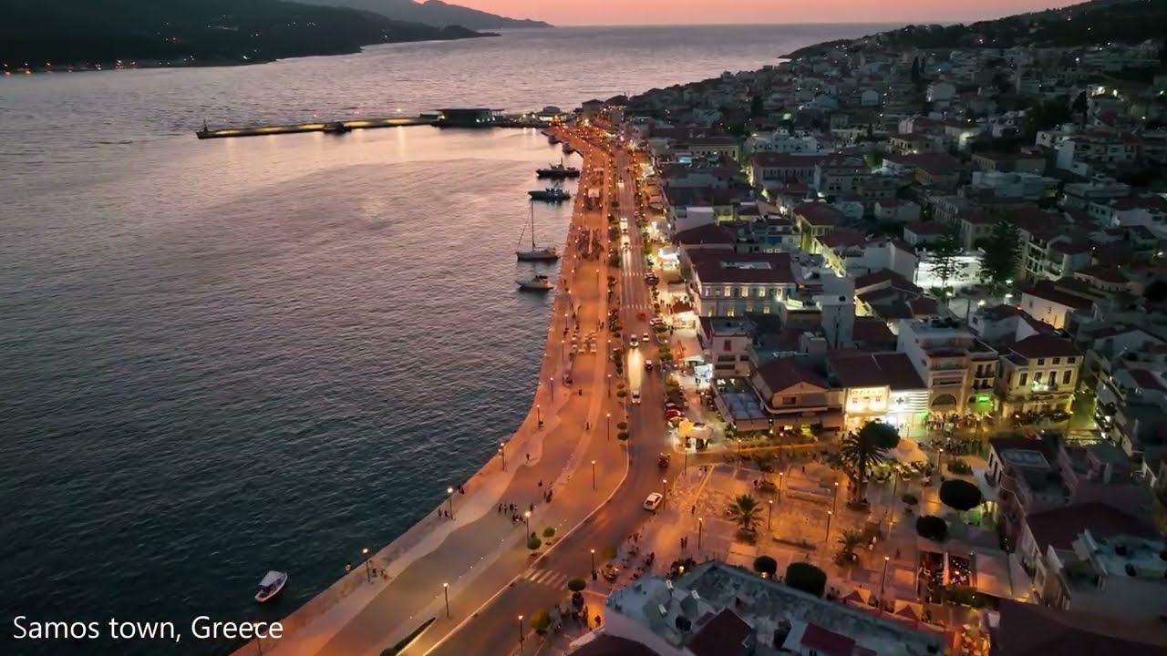 Drone flight over Samos town, Greece at dusk