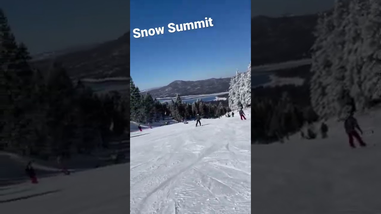 Riding down slopes at Snow Summit. Look at Big Bear lake in the background.
