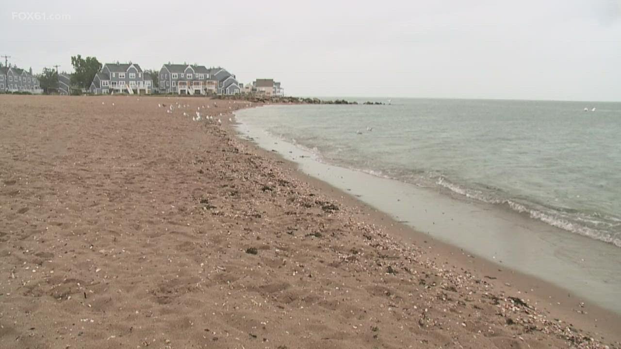 East Haven residents visit Cosey Beach where its rainy but overall calm