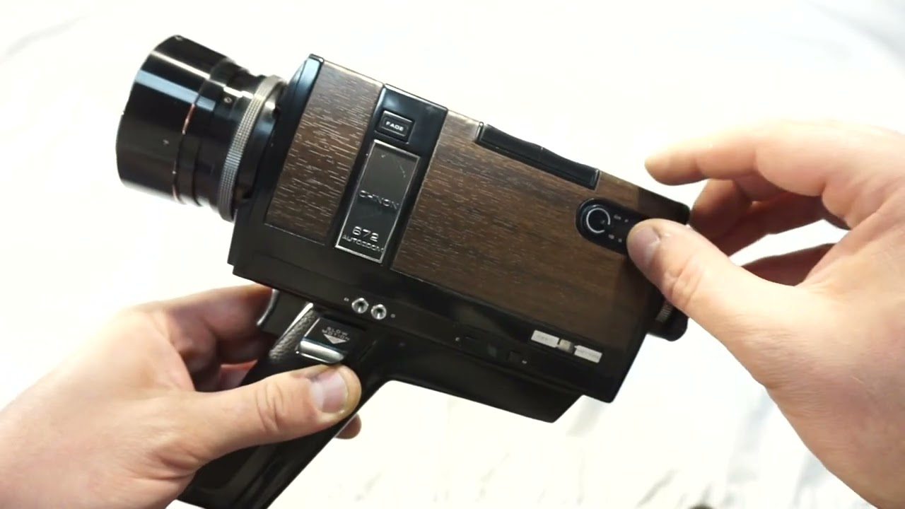 Chinon 672 loading Super 8 film and batteries on Super 8 camera Chinon 672 - Auto Zoom + free ship!
