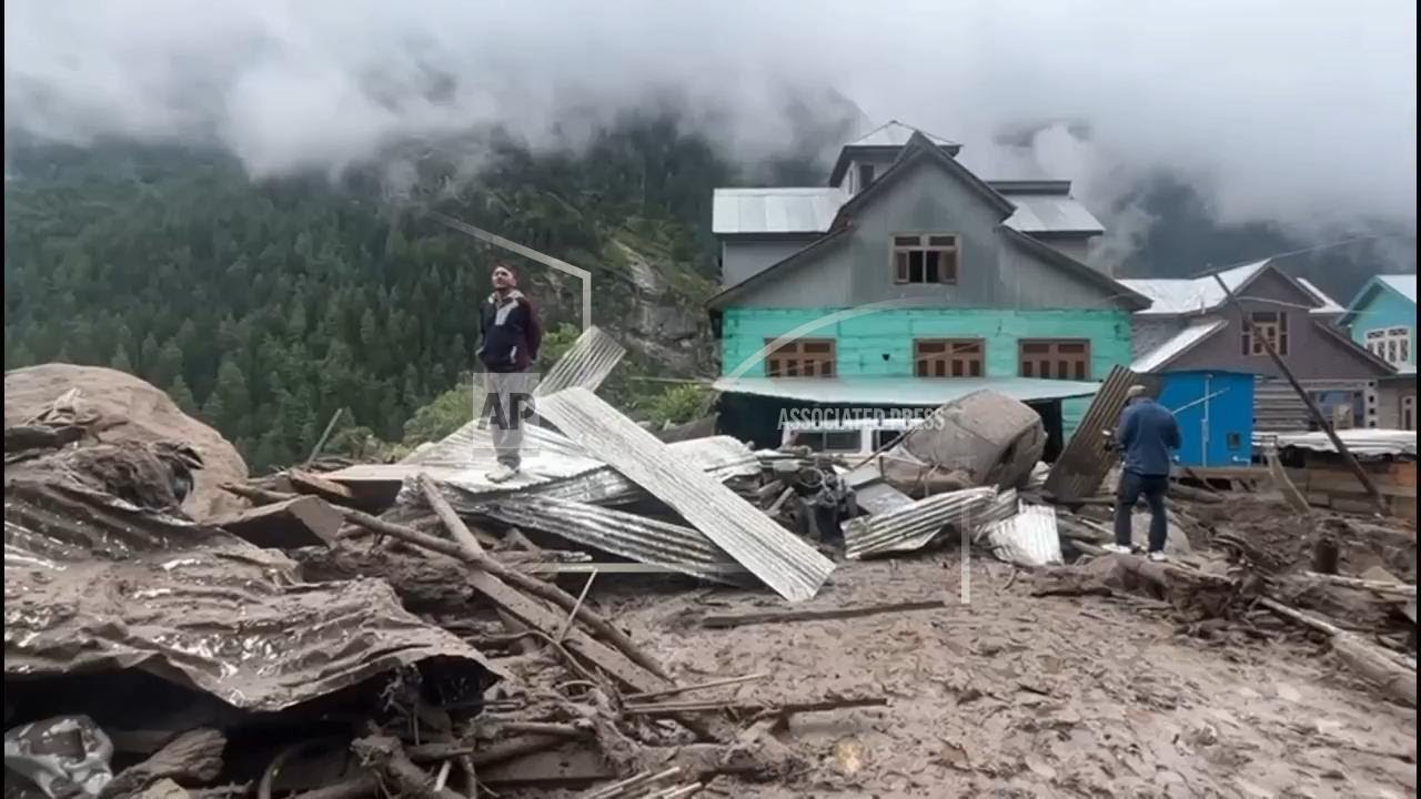 Torrential rains trigger flash floods in India controlled Kashmir, killing at least 56 and leaving s