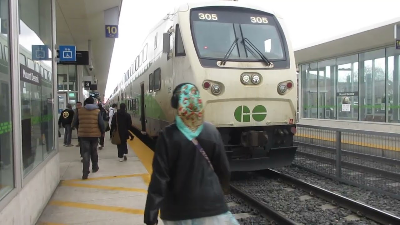 GO Transit Cab Car 305 and MP40PH Locomotive 681 arriving and departing Mt Dennis Station