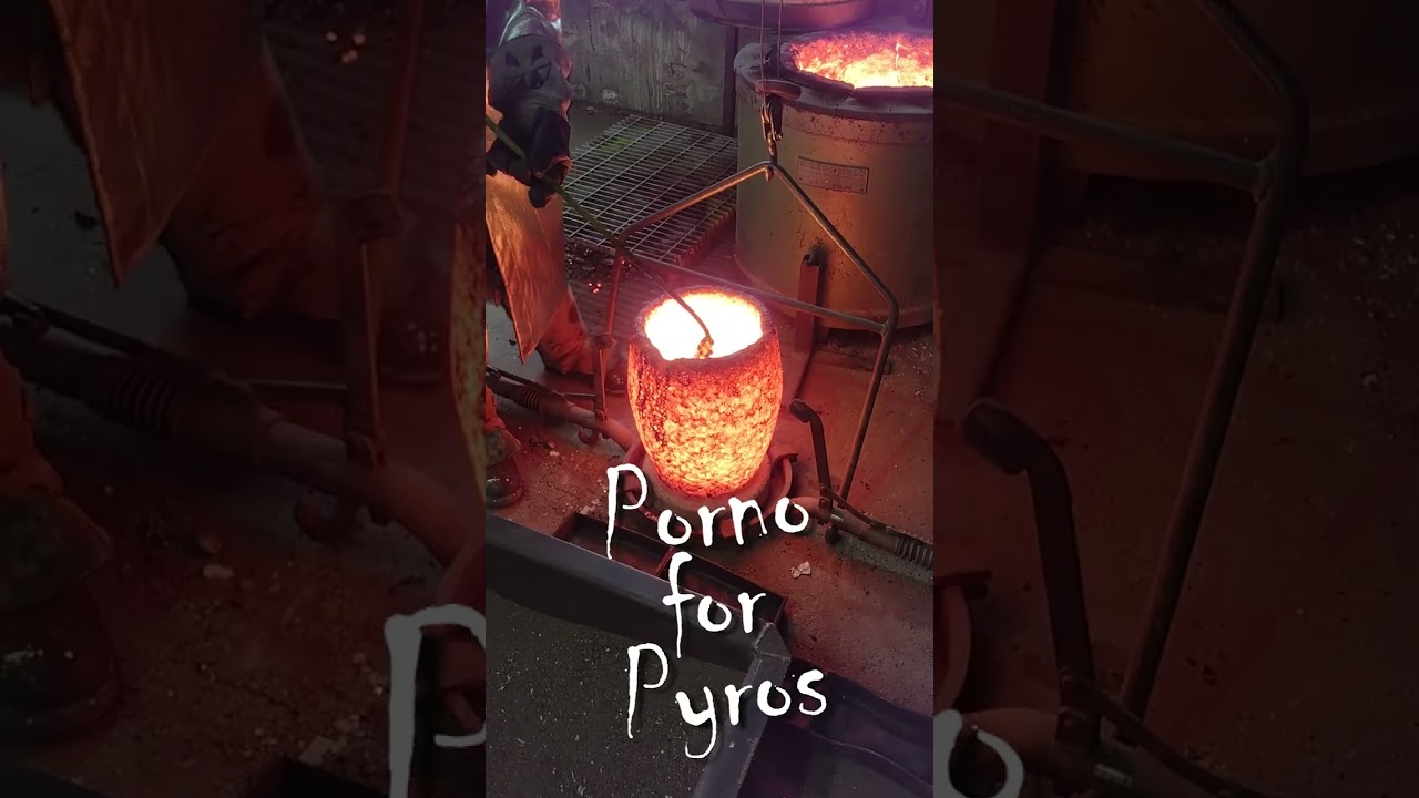 Pouring Bronze In The Foundry