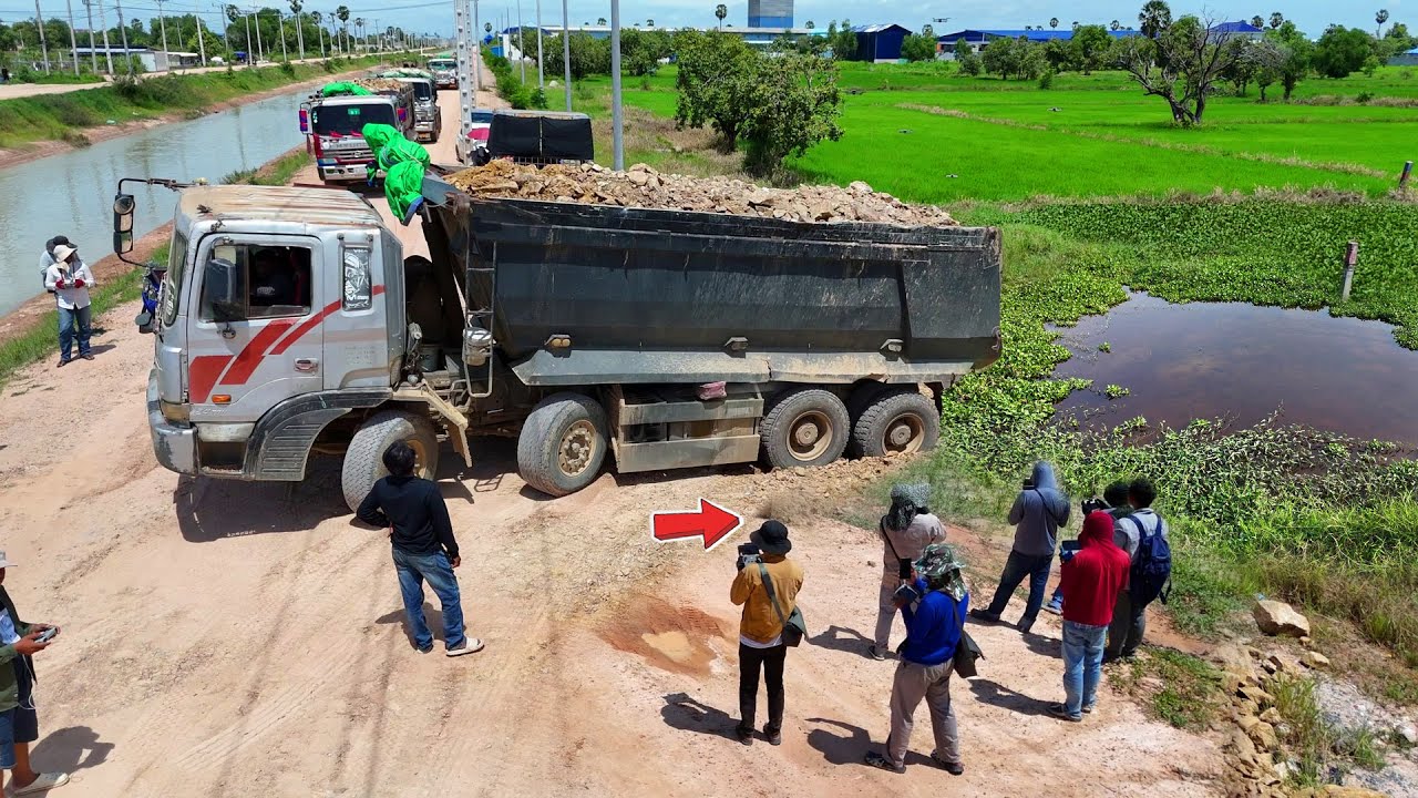 Be Careful! Start New Landfill Project! By Dump Truck 25.5Ton Fill soil beside canal & Dozer Pushing