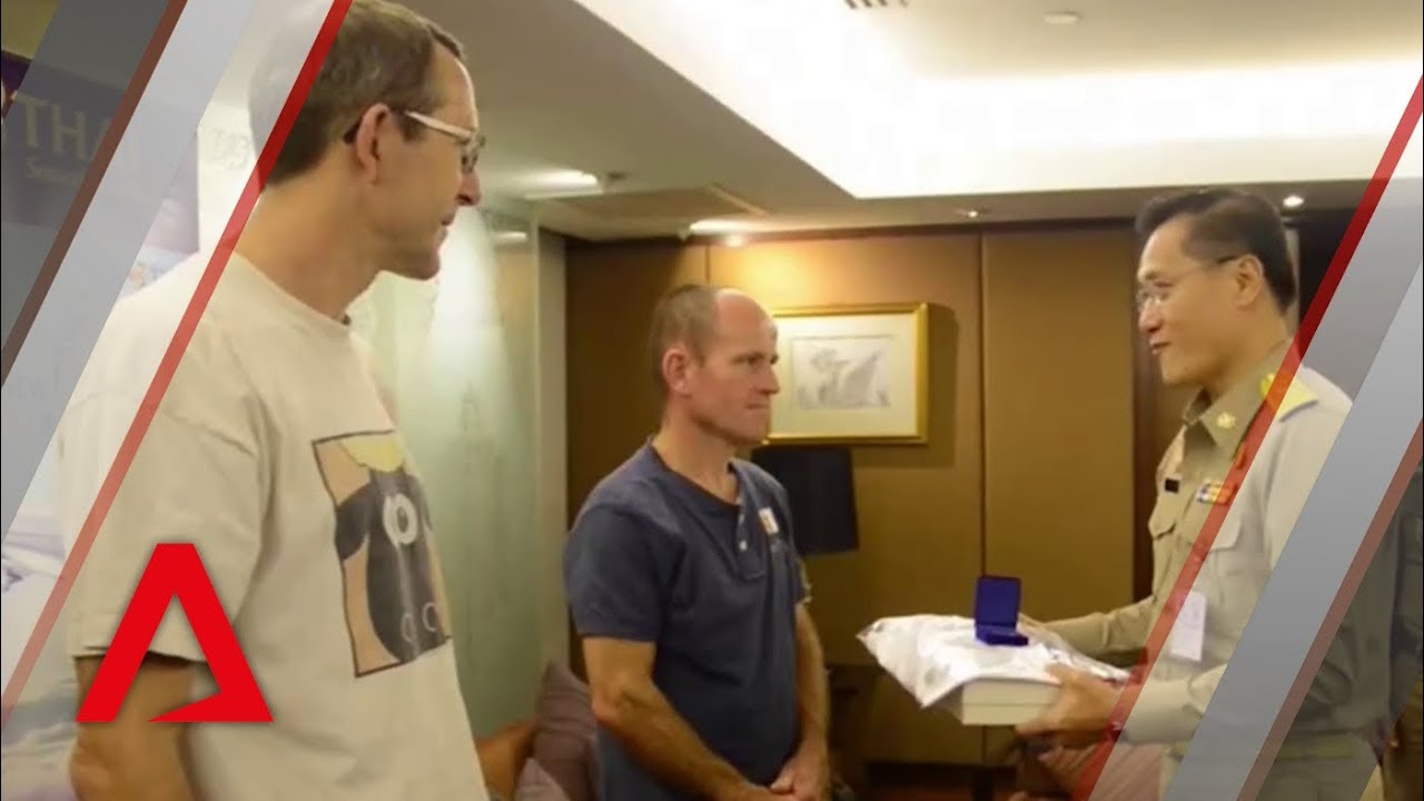 Thai cave rescue: 2 British divers applauded in airport send-off