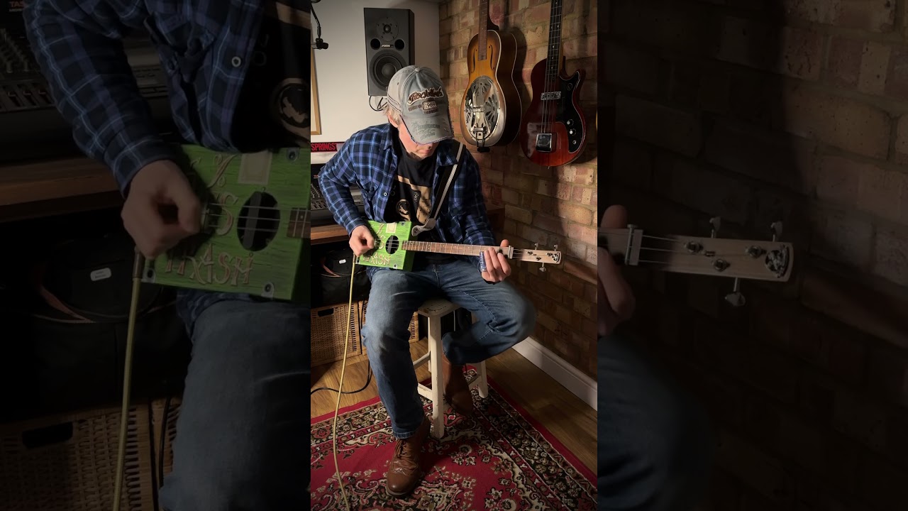 Delta Blues on a 3 string cigar box guitar. 
