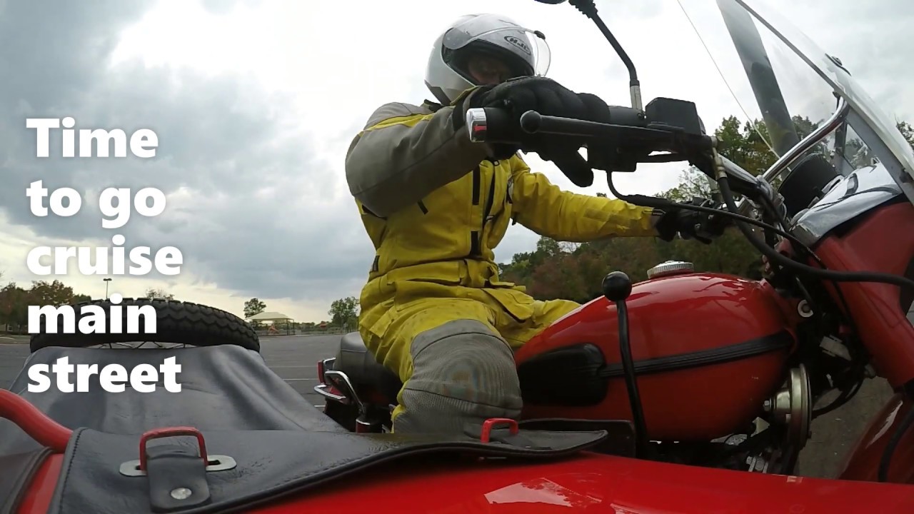 Ural Sidecar Motorcycle Driving One Wheel Drive with Chair Flying
