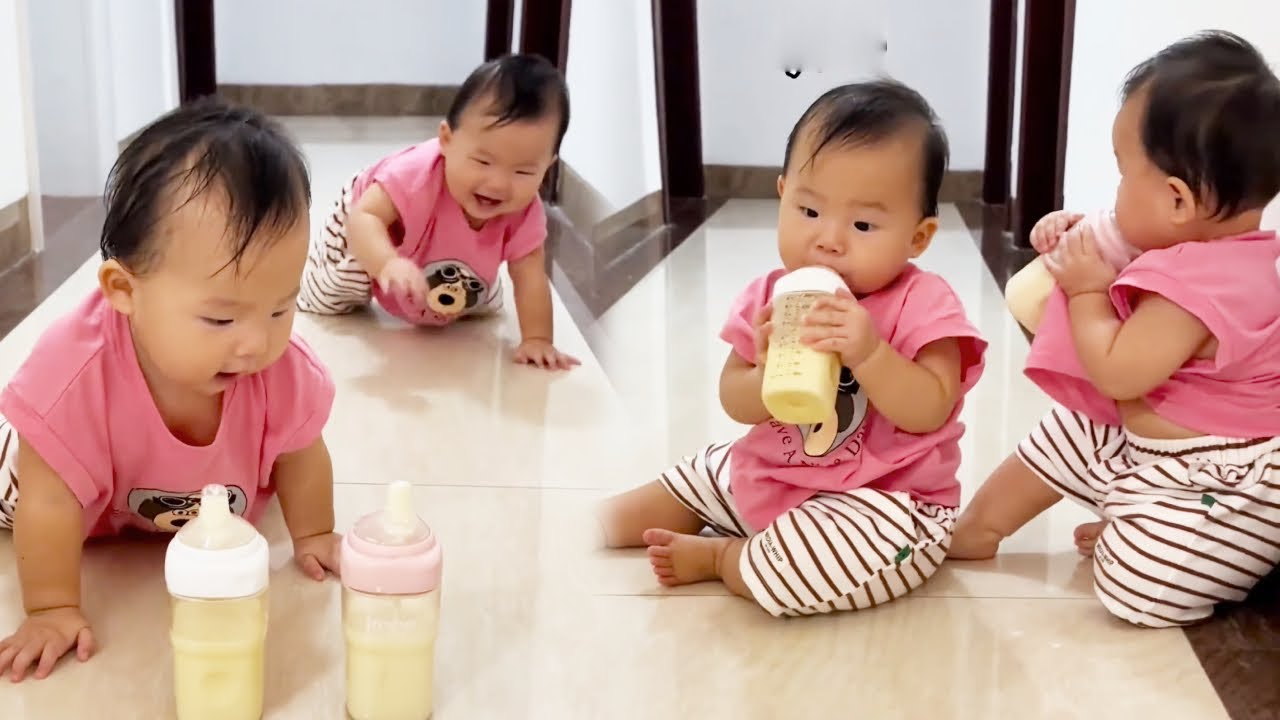The two cute kids couldn't control themselves when they saw the bottle