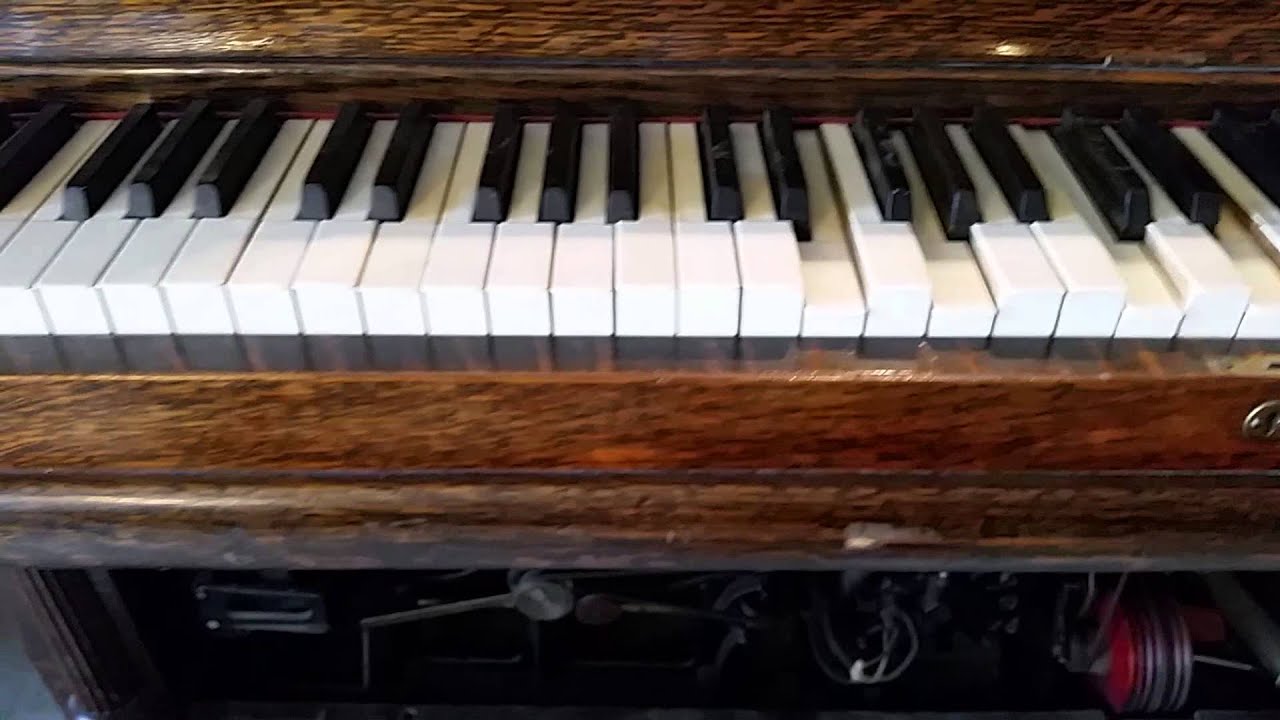 Cremona coin operated player piano...